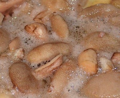 Маслюки стали рожевими після варіння: причини