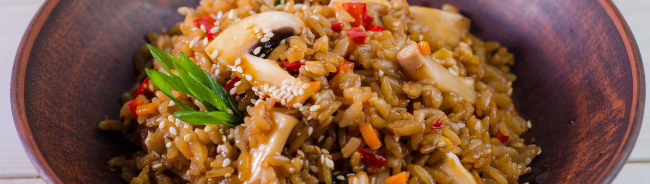 Рецепт смачного рису з печерицями та овочами