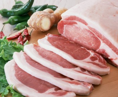 Китай сумує за свининою: уживається собаче м'ясо