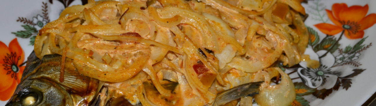 Як смачно приготувати карася в духовці